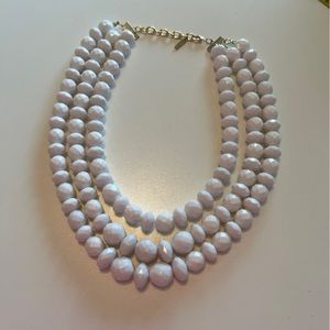 Three strand bead necklace